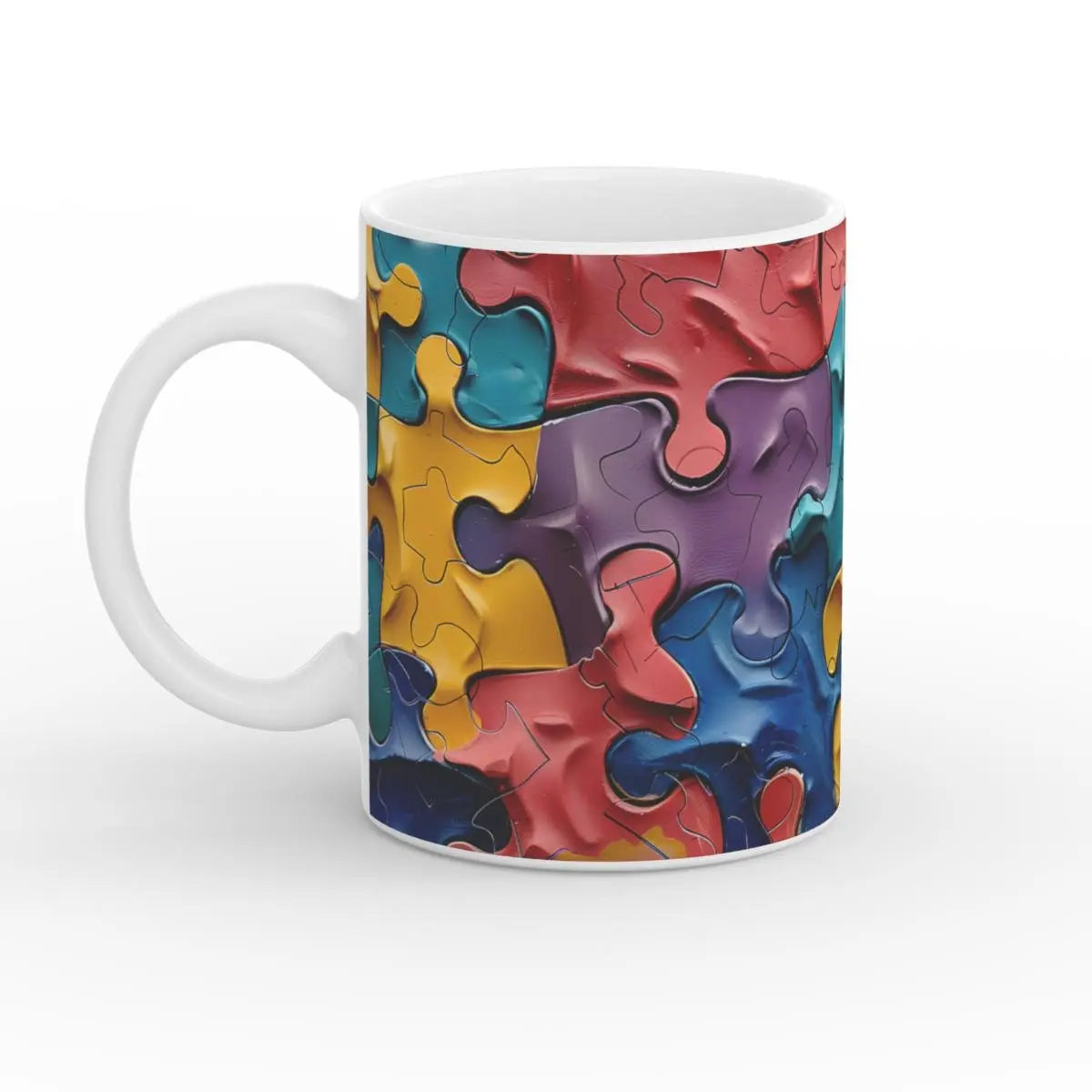 Weiße Kaffeetasse mit buntem Puzzle-Motiv – perfekt für kreative Köpfe
