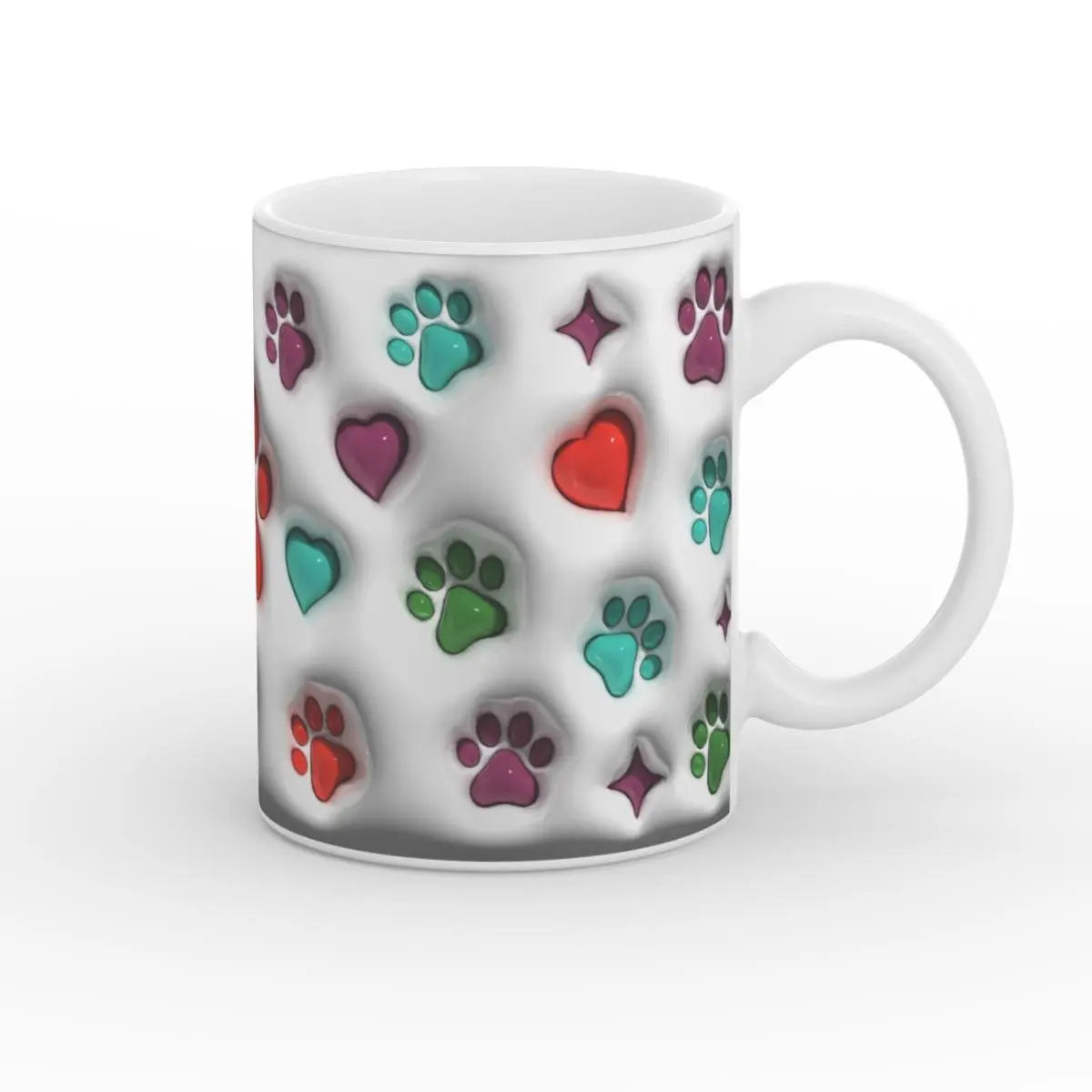 Keramiktasse mit glänzender Oberfläche, dekoriert mit grünen, roten und lila Pfotenabdrücken und Herzen.