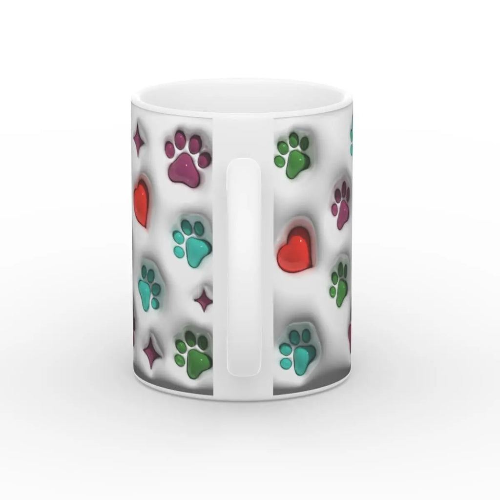 Rückansicht der Tasse mit Henkel in der Mitte, umgeben von bunten Pfotenabdrücken und Herzen.